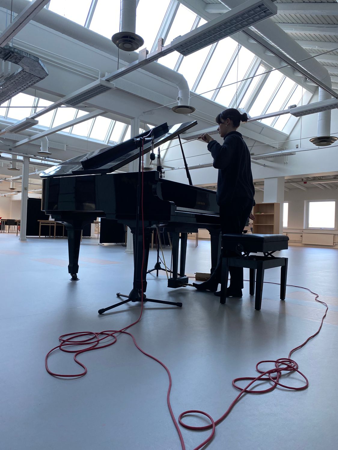 Linnéa at the grand piano, recording sound experiments at Sound Hub Denmark © Fran Villalba